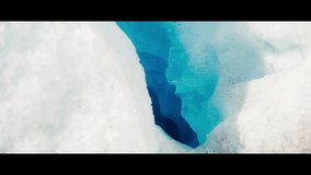 Cinematic snow lake with icy white rocks|Beautiful snow lake with snow-covered rocks - Powered by Shutterstock - Get 15% off with code: PIKWIZARD15