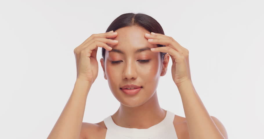 Portrait of a young Asian girl with light makeup and perfect skin. Beautiful face of young woman with natural skin.