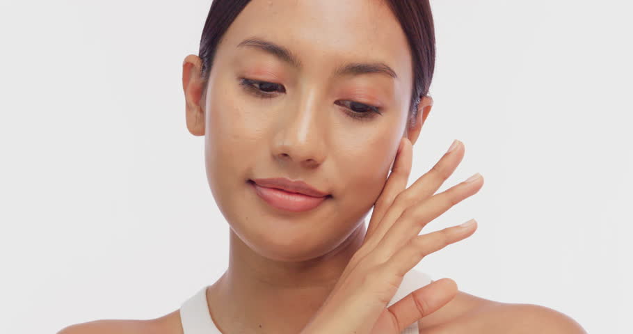 Portrait of a young Asian girl with light makeup and perfect skin. Beautiful face of young woman with natural skin.