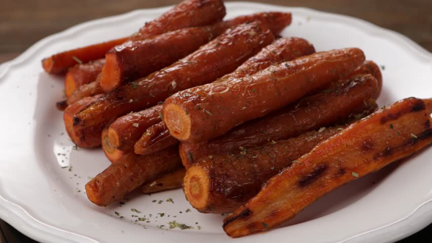 roasted baby carrots on plate rotation food