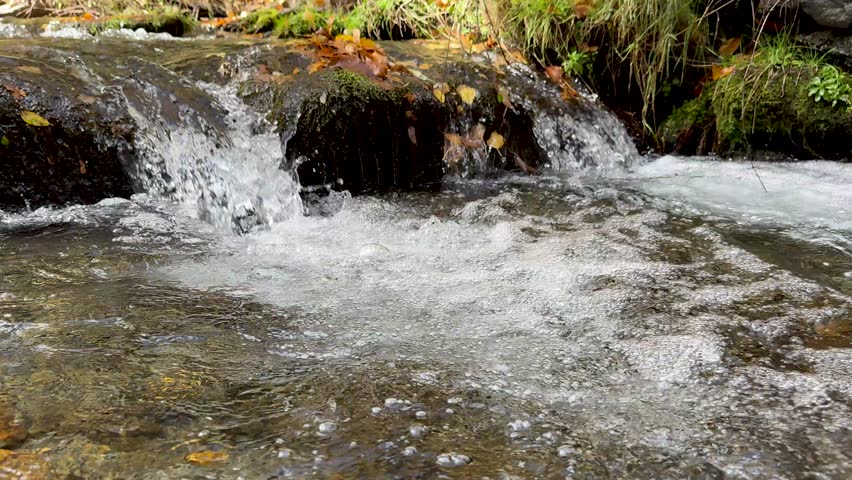 Crystal-clear mountain stream in Sierra Nevada near Granada, Spain