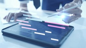 Project management concept, colleagues collaborating on a teamwork project timeline task and team planning a schedule, virtual analytics dashboard - Powered by Shutterstock - Get 15% off with code: PIKWIZARD15