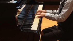 Image of a boy playing the piano - Powered by Shutterstock - Get 15% off with code: PIKWIZARD15
