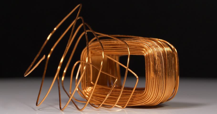 Copper or cuprum is chemical element and non ferrous metal. Copper winding of electric current transformer, zoom-out video