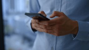 Professional using a mobile phone for online communication, highlighting digital networking, business connectivity, and modern workplace interaction. - Powered by Shutterstock - Get 15% off with code: PIKWIZARD15