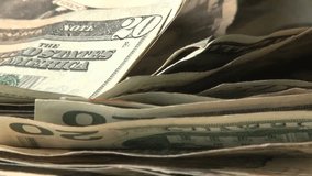 Close-up of rotating money bills on a dark background, symbolizing finance, wealth, investment, and business concepts in motion. - Powered by Shutterstock - Get 15% off with code: PIKWIZARD15