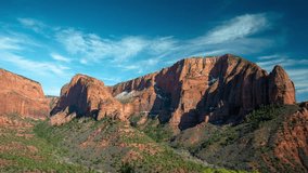 Timelapse, Zion National Park Utah USA Kolob Canyon, Red Cliffs, Green Vegetation and Blue Sky 4k - Powered by Shutterstock - Get 15% off with code: PIKWIZARD15