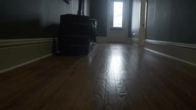 Establishing walking shot through an old hallway toward a door, creating a mysterious, cinematic atmosphere with 4K clarity. - Powered by Shutterstock - Get 15% off with code: PIKWIZARD15