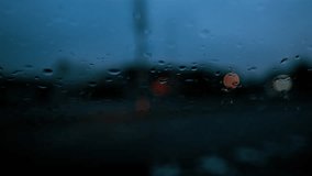 Rainy Night Car Headlights Bokeh Through Wet Glass  - Powered by Shutterstock - Get 15% off with code: PIKWIZARD15