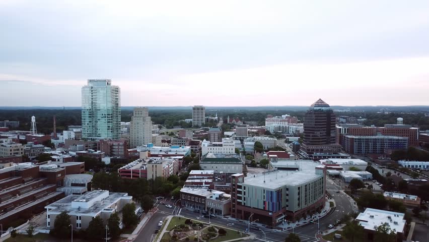 Aerial WS Pushing into Durham Skyline in NC 4k