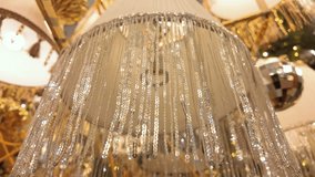 Glittering fringe lampshade with metallic tassels for festive interior decor - Powered by Shutterstock - Get 15% off with code: PIKWIZARD15