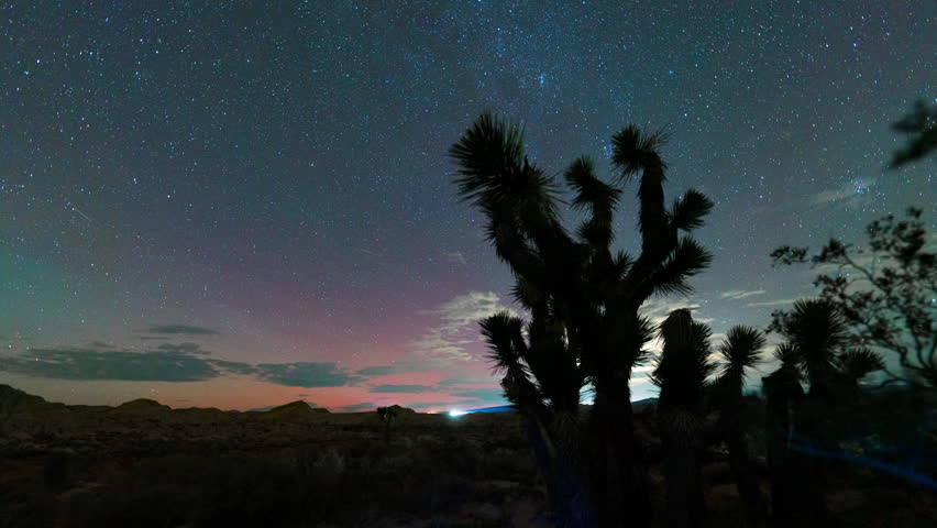TImelapse tracking shot of rare aurora borealis over Joshua Tree in Mojave Desert in Southern California on November 12th, 2025