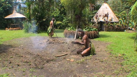 PAPUA NEW GUINEA - NOV.4: Traditional villagers making a fire, in the Mt. Hagen Highland area in Papua New Guinea, November 4, 2008.