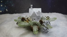 A Christmas house covered in snow, spruce branches, pine cones, and white snow - Powered by Shutterstock - Get 15% off with code: PIKWIZARD15