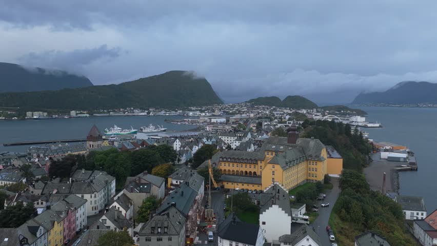 Top-down view of colorful Alesund bathed in early morning light, Norway