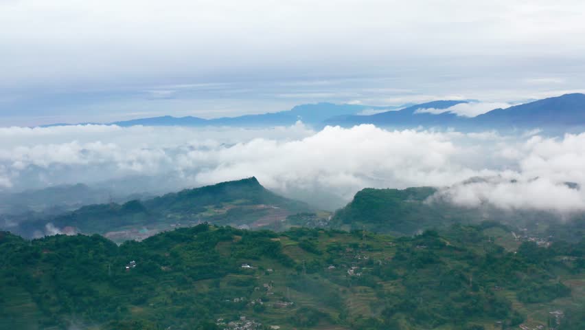Early Morning Sea of Clouds Rolling Over Forest Landscape 4K Real Time