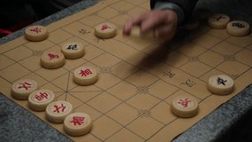 Chinese people relax and play Card game also Xiangqi (Chinese Chess) , Traditional Chinese Game - Powered by Shutterstock - Get 15% off with code: PIKWIZARD15