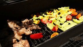Juicy meat and colorful bell peppers sizzle on a hot outdoor barbecue grill. Perfect for summer cookouts, family gatherings, and delicious healthy meal preparation food content. - Powered by Shutterstock - Get 15% off with code: PIKWIZARD15