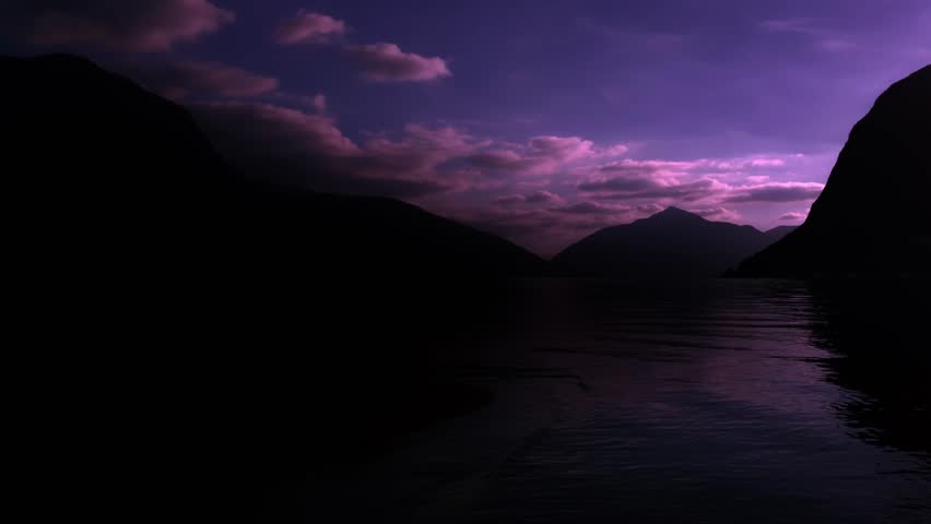 A dramatic sunset over Lake Lugano with purple clouds, mountain silhouettes and a lone bird gliding across the sky, creating a moody and atmospheric lakeside panorama in Switzerland.