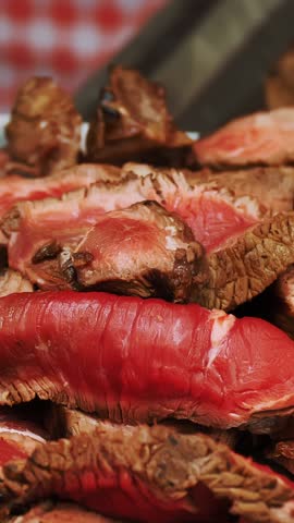 Meat. street food. close-up. grilled meat. Barbecue. fair. food festival. Outdoor cooking. Meat on skewers. Meat on the bone. street market. culinary exhibition or fair.