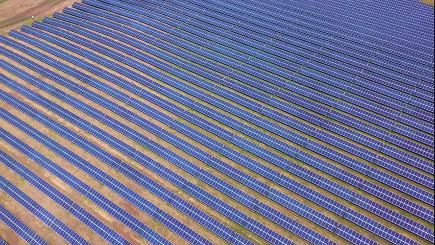 Aerial view Of Solar Panels Collecting Sun Light Green Energy Nature Preservation Ecology Innovation Clean Green Living Concept.