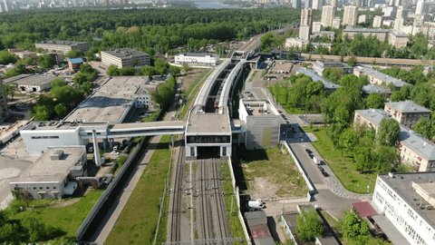 High Drone Angle over Tracks Leading Station