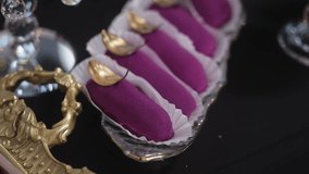 Luxury dessert table with colorful macarons mousse cakes, and elegant sweets on golden stands, stylish catering arrangement for wedding or celebration showcasing gourmet confectionery fine patisserie - Powered by Shutterstock - Get 15% off with code: PIKWIZARD15