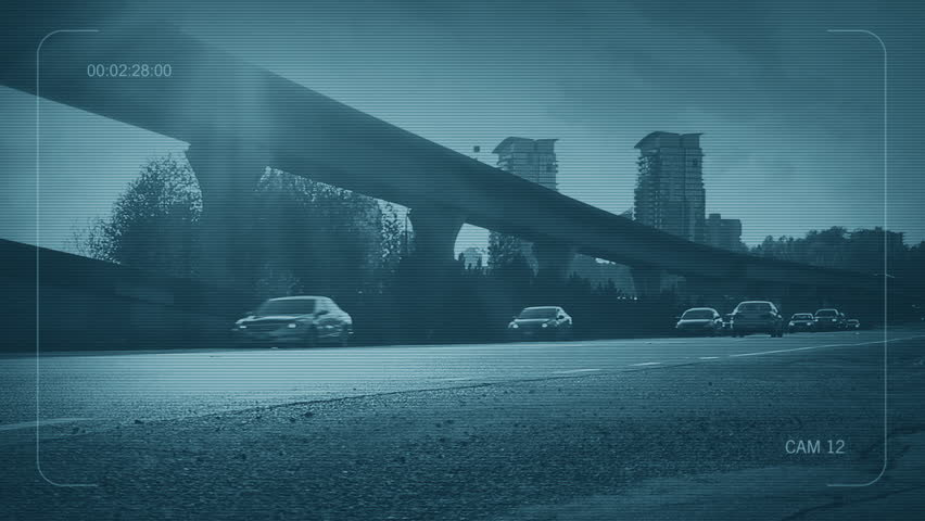 CCTV Busy Road With Train Passing