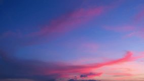 A vibrant sunset sky time-lapse showcasing wispy cirrus clouds glowing pink and purple, drifting gently across the horizon as fading light paints the atmosphere with warm, dynamic hues. Time lapse.
 - Powered by Shutterstock - Get 15% off with code: PIKWIZARD15