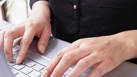 Close-up of female hands typing on a laptop with a fill icon displaying a percentage of technical support. - Powered by Shutterstock - Get 15% off with code: PIKWIZARD15