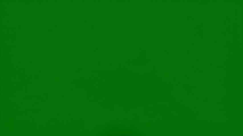 White smoke plume on a green screen background.