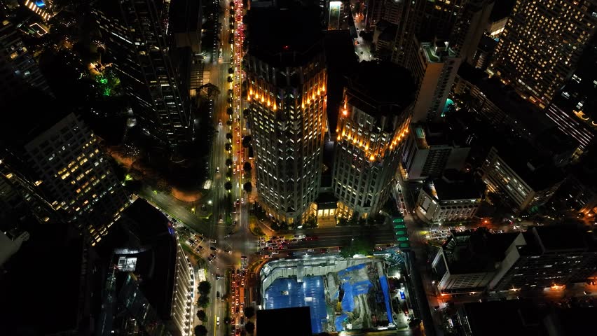 Busy Highway at night. High rise buildings in Makati. Metro Manila. Luzon, Philippines.