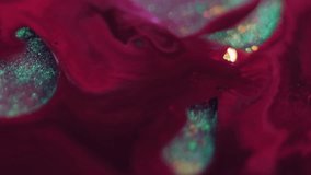 Color ink. Kaleidoscope art. Defocused red crimson blue paint droplet shiny water liquid on creative wet texture dark black background. - Powered by Shutterstock - Get 15% off with code: PIKWIZARD15