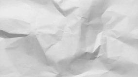 Close-up of crumpled white paper texture, ideal for backgrounds, graphic design, video overlays, and artistic or creative projects. - Powered by Shutterstock - Get 15% off with code: PIKWIZARD15