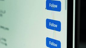Close-up of a computer screen showing someone clicking “Follow” on social media profiles. A modern take on online habits, social media culture, and digital connection. - Powered by Shutterstock - Get 15% off with code: PIKWIZARD15