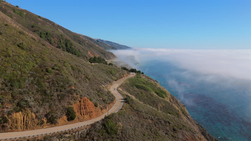 Come and explore the breathtaking stunning beauty of Big Sur, California, with its incredible aerial views that showcase the dramatic rocky coastline alongside the majestic and vast Pacific Ocean
