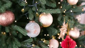 Green pine branches with festive ornaments and fairy lights, close up, holiday season - Powered by Shutterstock - Get 15% off with code: PIKWIZARD15