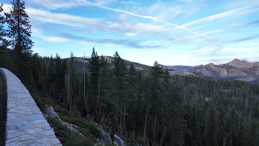 The viewpoint captures both the immensity and detail of Yosemite’s terrain, from distant peaks to the valley floor.