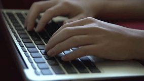 A focused child types on a laptop keyboard, learning and exploring technology. Footage highlights education, digital skills, and modern childhood development. - Powered by Shutterstock - Get 15% off with code: PIKWIZARD15