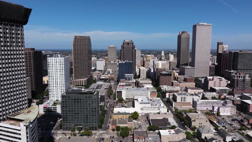 Drone Flying Away from New Orleans Skyscrapers. Summer