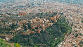 Drone flying aerial view Granada Spain beautiful Alhambra palace with Generalife gardens UNESCO World Heritage travel scenic landscape horizon sky clouds destination tourism nature viewpoint adventure - Powered by Shutterstock - Get 15% off with code: PIKWIZARD15