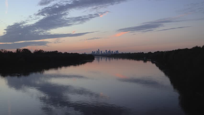 View from Siekierkowski bridge on the Vistula River and city downtown in Warsaw, Poland, 4k footage