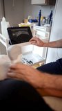 Experienced medical professional conducting a musculoskeletal ultrasound examination on a patient's knee joint, using a portable probe and analyzing the real time image on a digital tablet screen - Powered by Shutterstock - Get 15% off with code: PIKWIZARD15