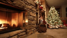 The cozy Christmas atmosphere in the living room is decorated in a classic style with a fire in the fireplace, a Christmas tree, candles, and gifts. The family is waiting for the holiday to relax. Dec - Powered by Shutterstock - Get 15% off with code: PIKWIZARD15