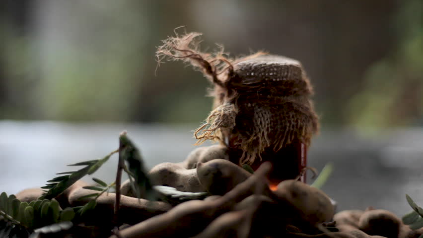 Rustic Ayurvedic Tamarindus indica Skin Oil and Extract in Gunny-Wrapped Bottle – Natural Herbal Treatment for Acne, Dark Spots, Pores, and Glowing Skin 