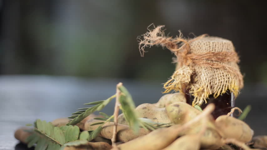 Rustic Ayurvedic Tamarindus indica Skin Oil and Extract in Gunny-Wrapped Bottle – Natural Herbal Treatment for Acne, Dark Spots, Pores, and Glowing Skin 