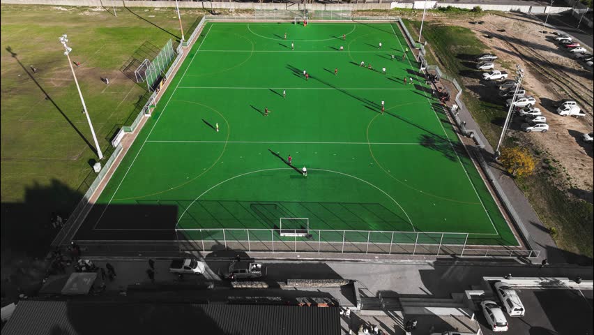 Drone hyper lapse of a hockey match.