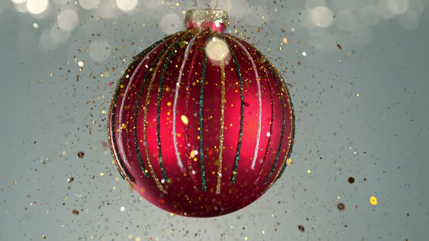 Christmas Decoration with Colored Shiny Balls and Glitters. Slow Motion Footage. Filmed on High Speed Cinema Camera, 1000 fps