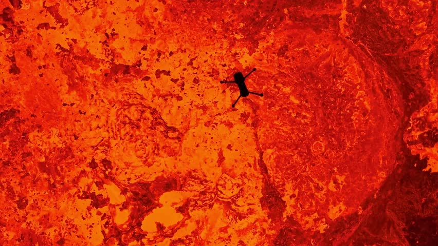 Aerial view of volcano crater spewing hot lava, close-up