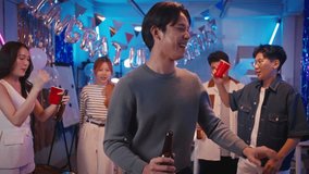 Excited young Asian business team celebrating the New Year 2026 or a major milestone achievement in office party,holding large foil number balloons,confetti falling.Concept of success, future goals - Powered by Shutterstock - Get 15% off with code: PIKWIZARD15